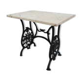 Bistro table with marble top on cast iron base