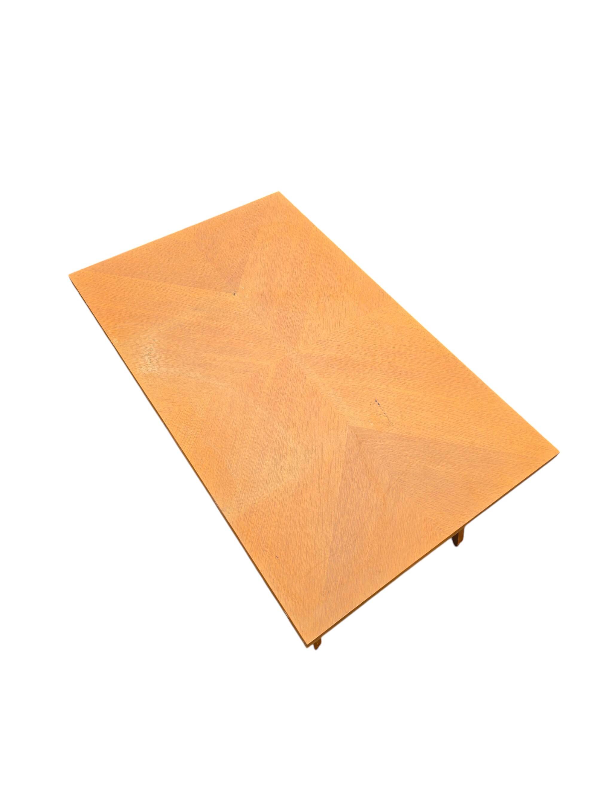 Scandinavian 1960s transformable coffee table in light wood.