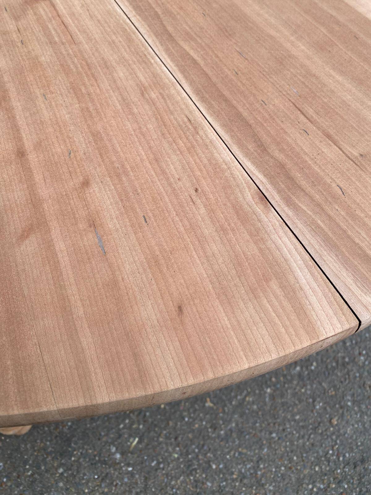 Round extendable dining table stripped in solid cherry wood France 1950