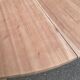 Round extendable dining table stripped in solid cherry wood France 1950