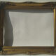 Golden sculpted frame for photo or artwork