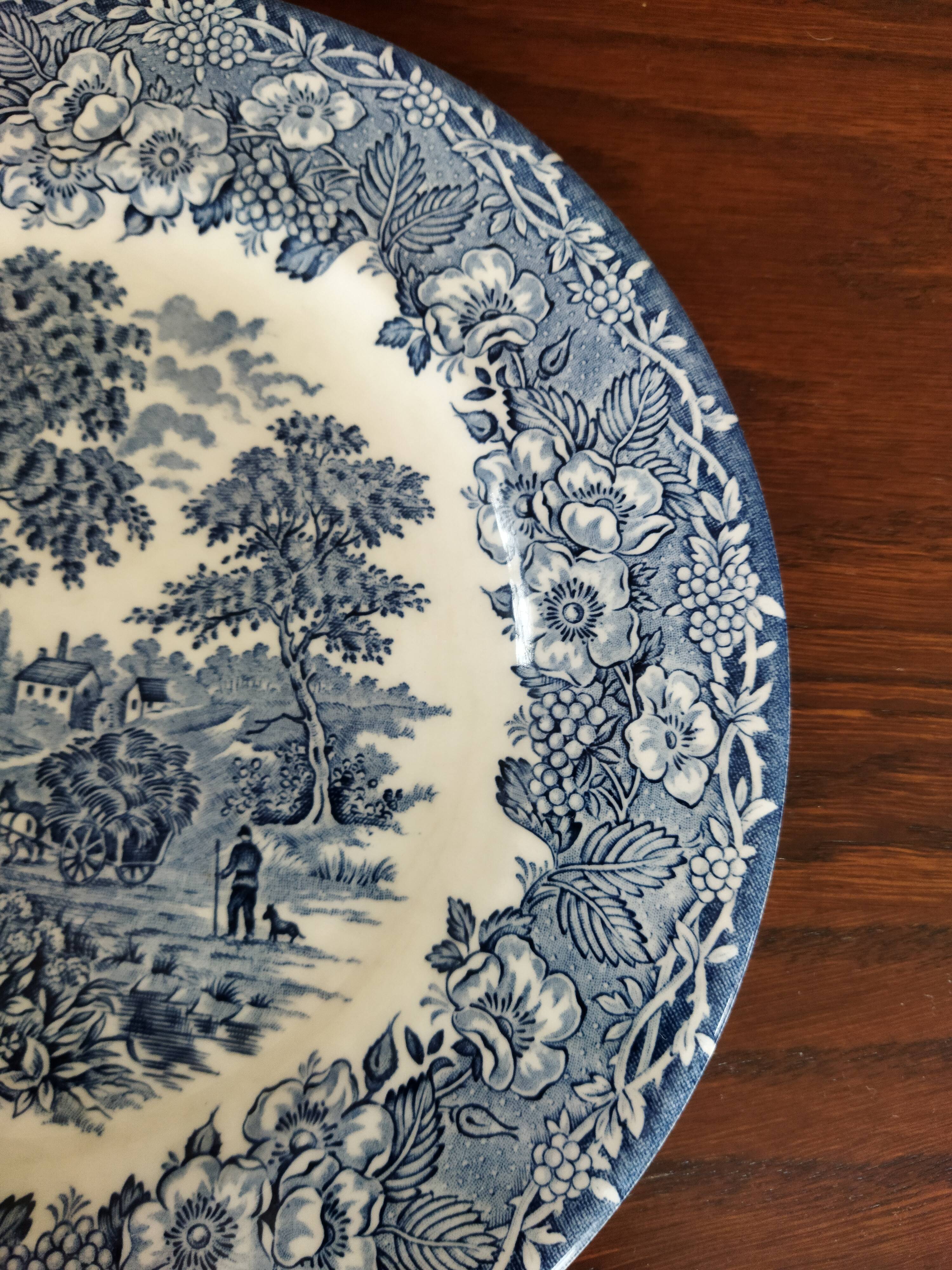 8 blue & white plates