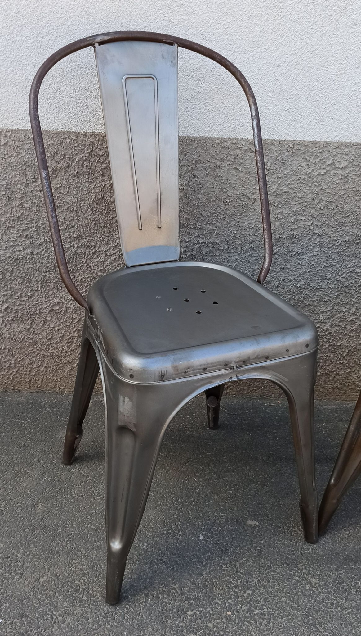 Pair of grey metal chairs