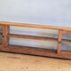 Vintage oak sideboard TV unit with sliding doors.