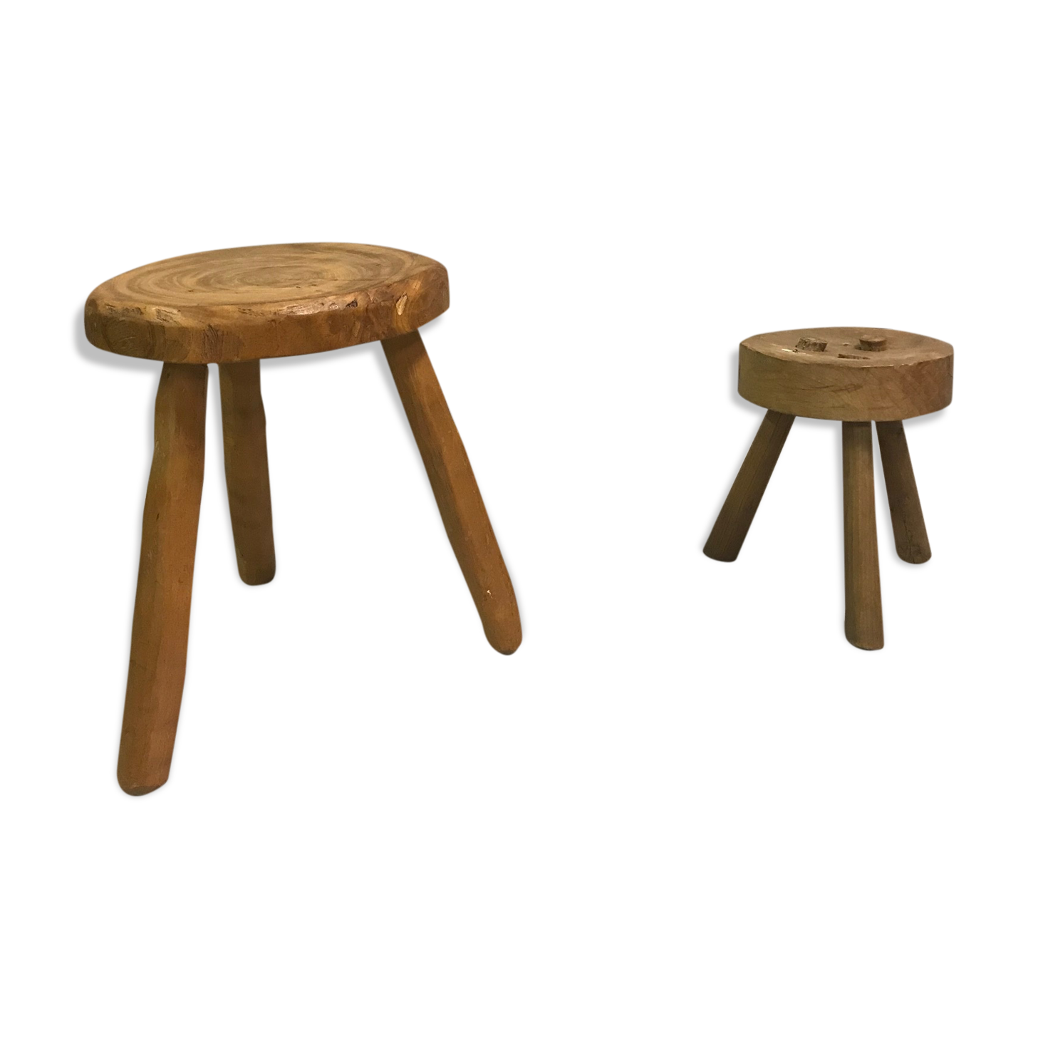 Two raw tripod stools