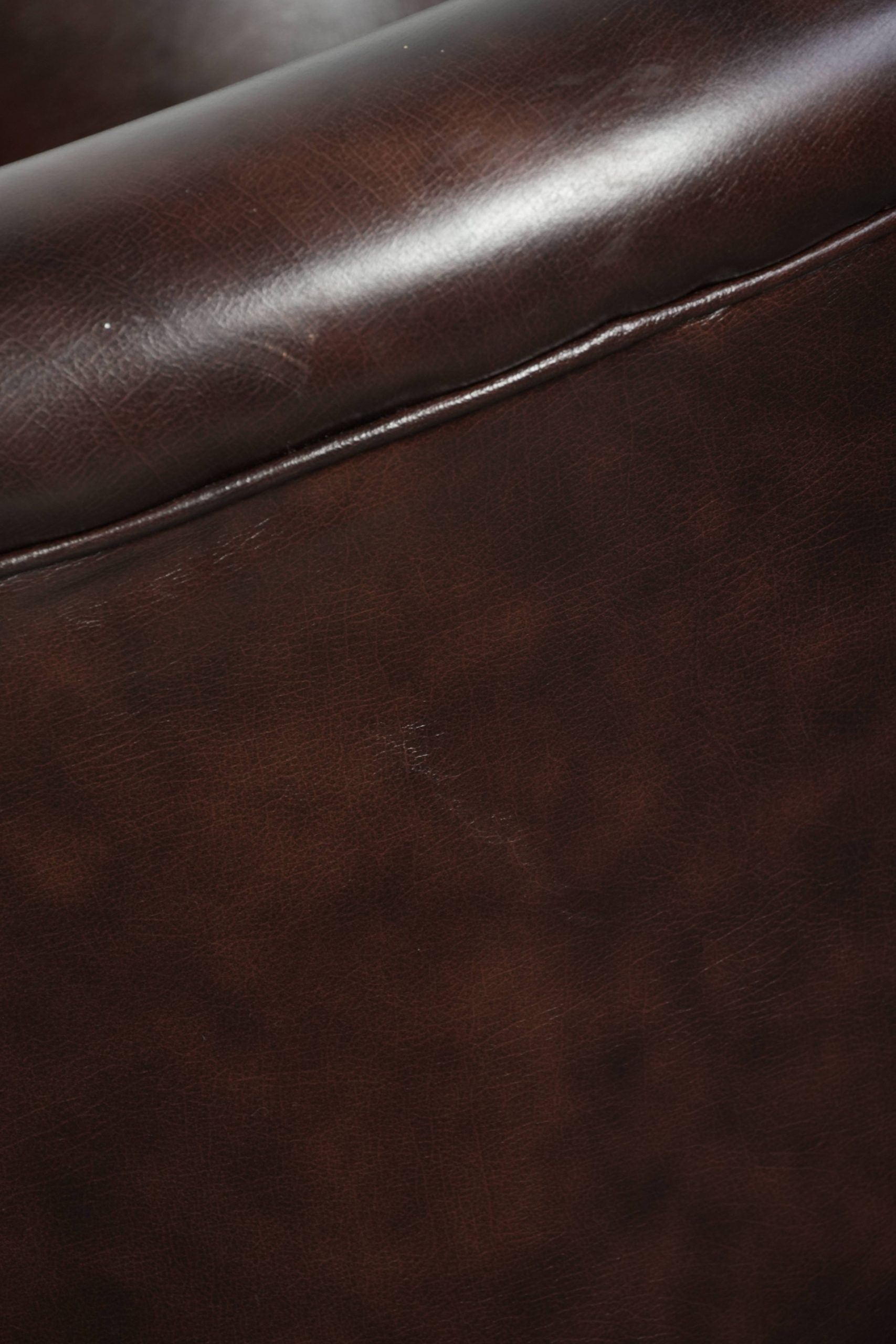 Set of two cowhide club armchairs in good condition with a English design