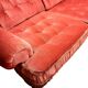 Vintage pink two-seater sofa with fringes