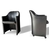 Pair of “S142” armchairs by Eugenio Gerli for Tecno – black leather
