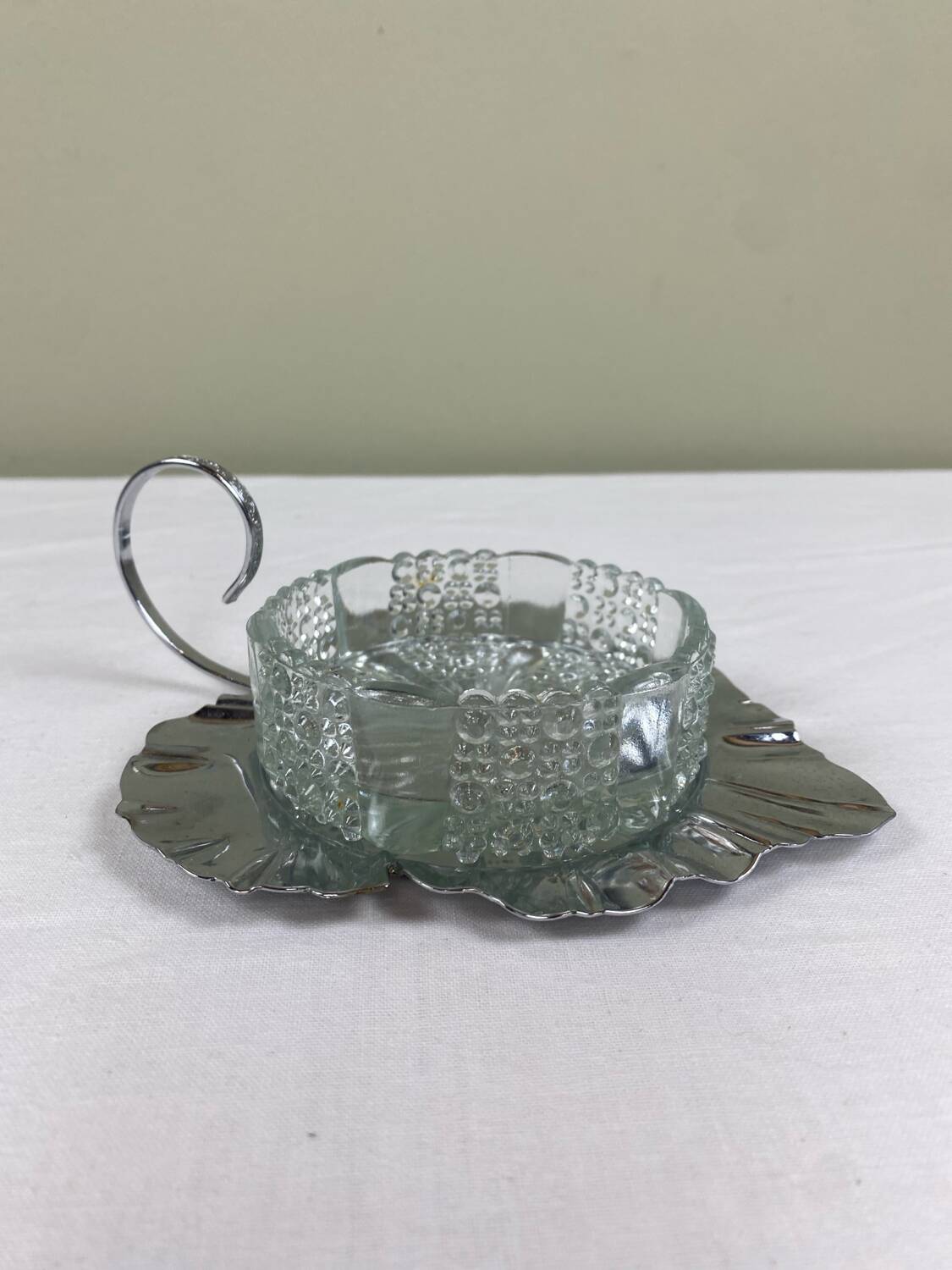 Metal and glass bowl