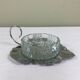 Metal and glass bowl