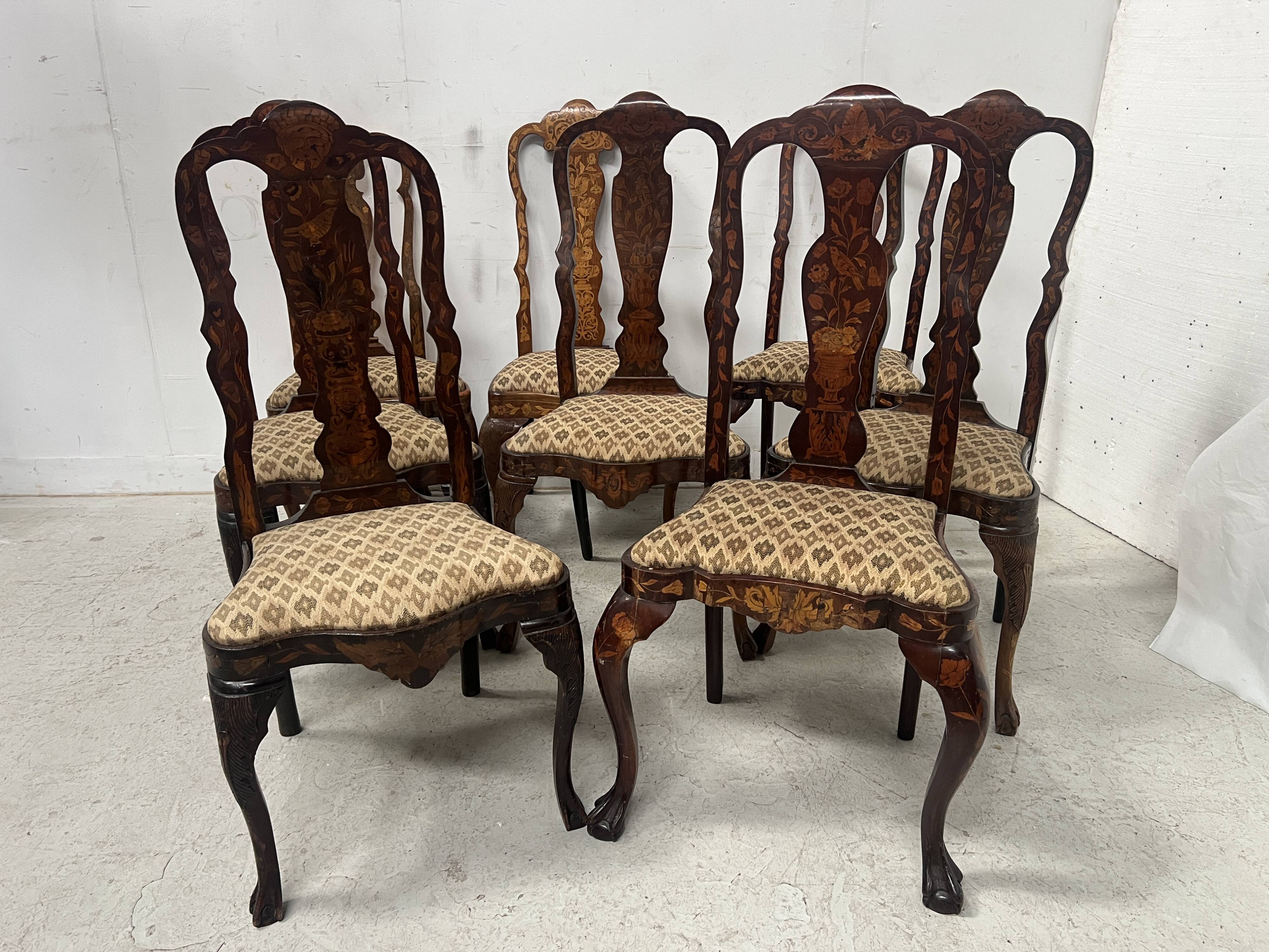 Set of eight Dutch marquetry chairs from the 19th century.