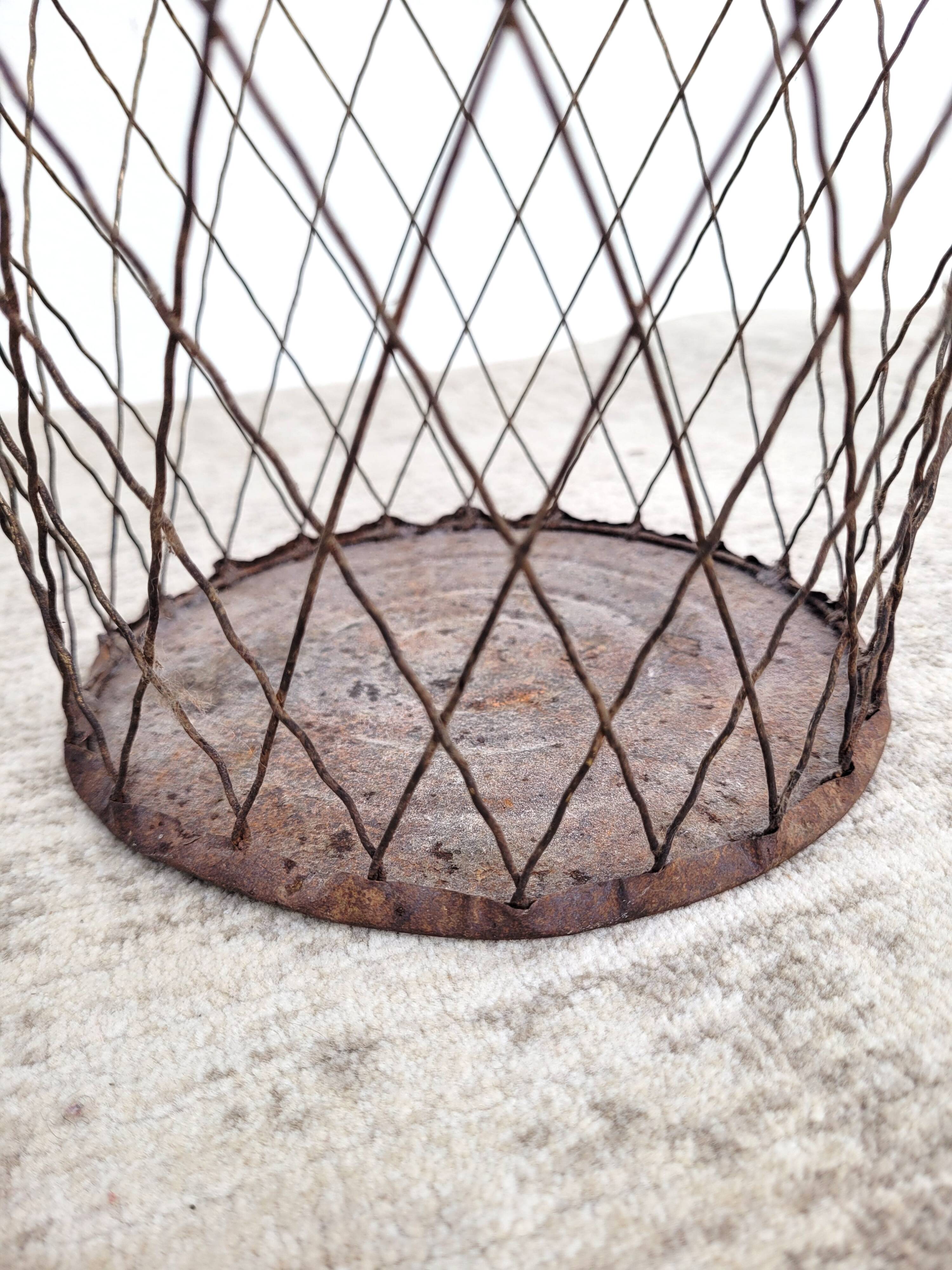 Old wire mesh wastebasket