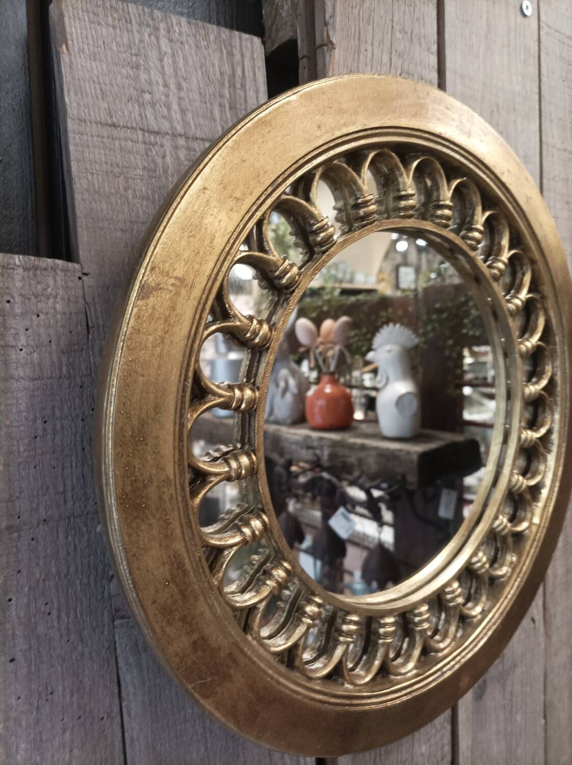 Round golden mirror