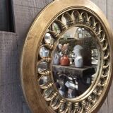 Round golden mirror