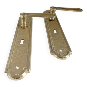 Poignées de porte contours perlés
