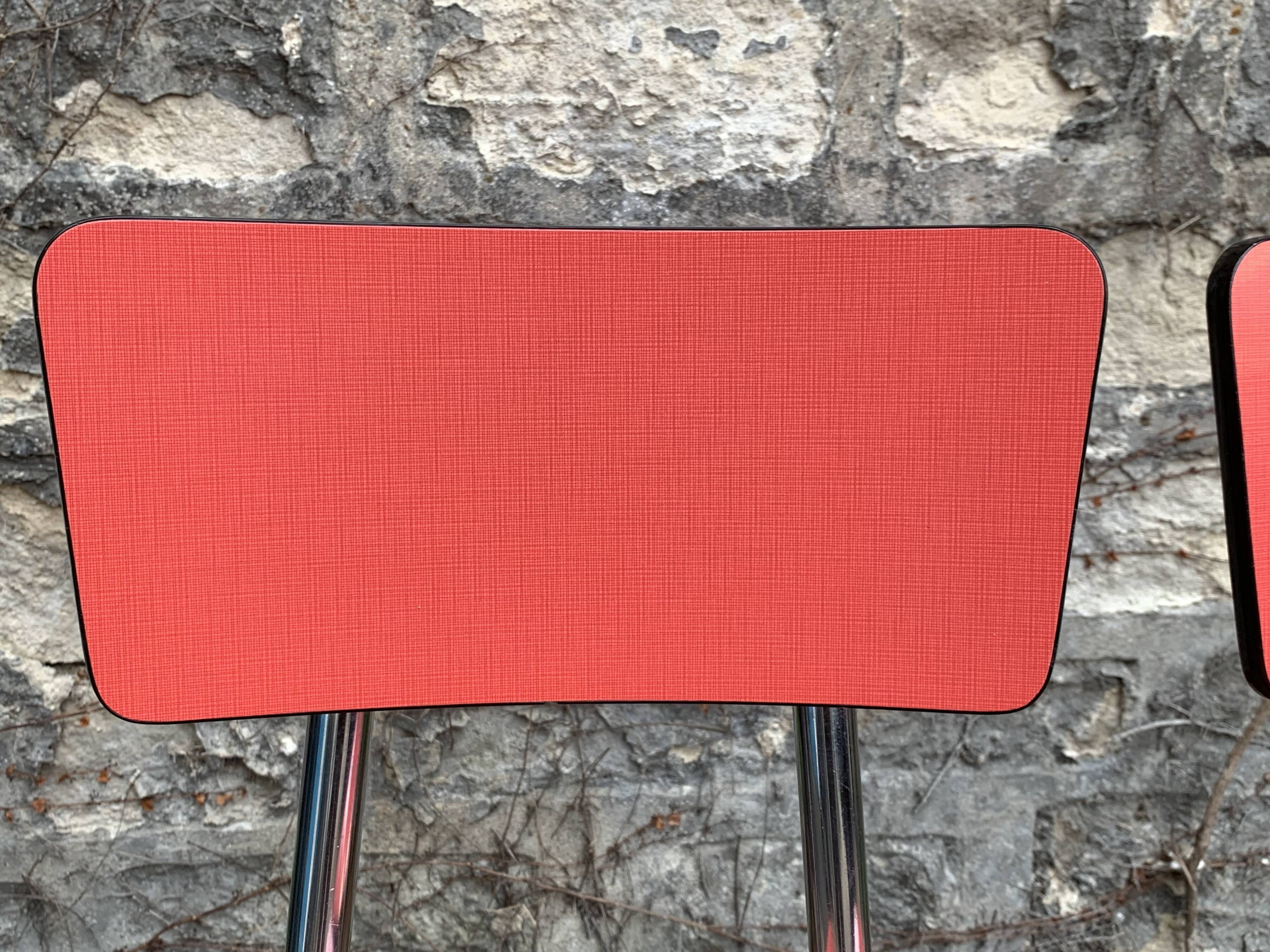 Pair of red Formica chairs Roc 1960