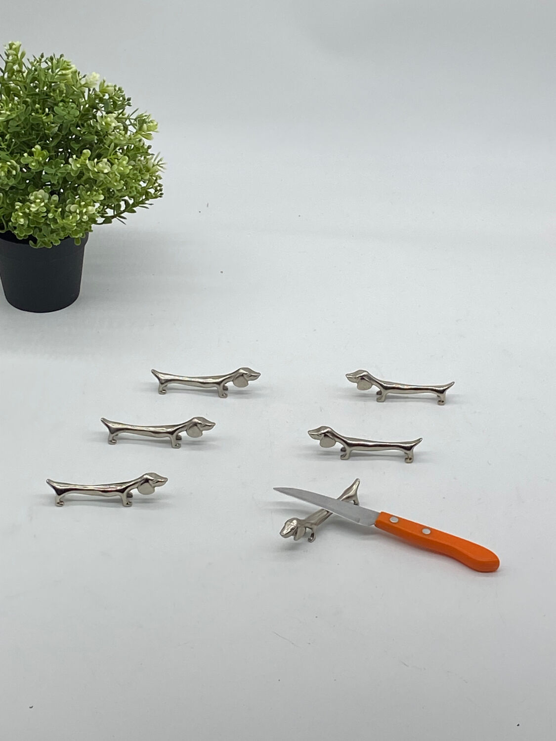 Knife holder, dog/dachshund, silver metal, vintage