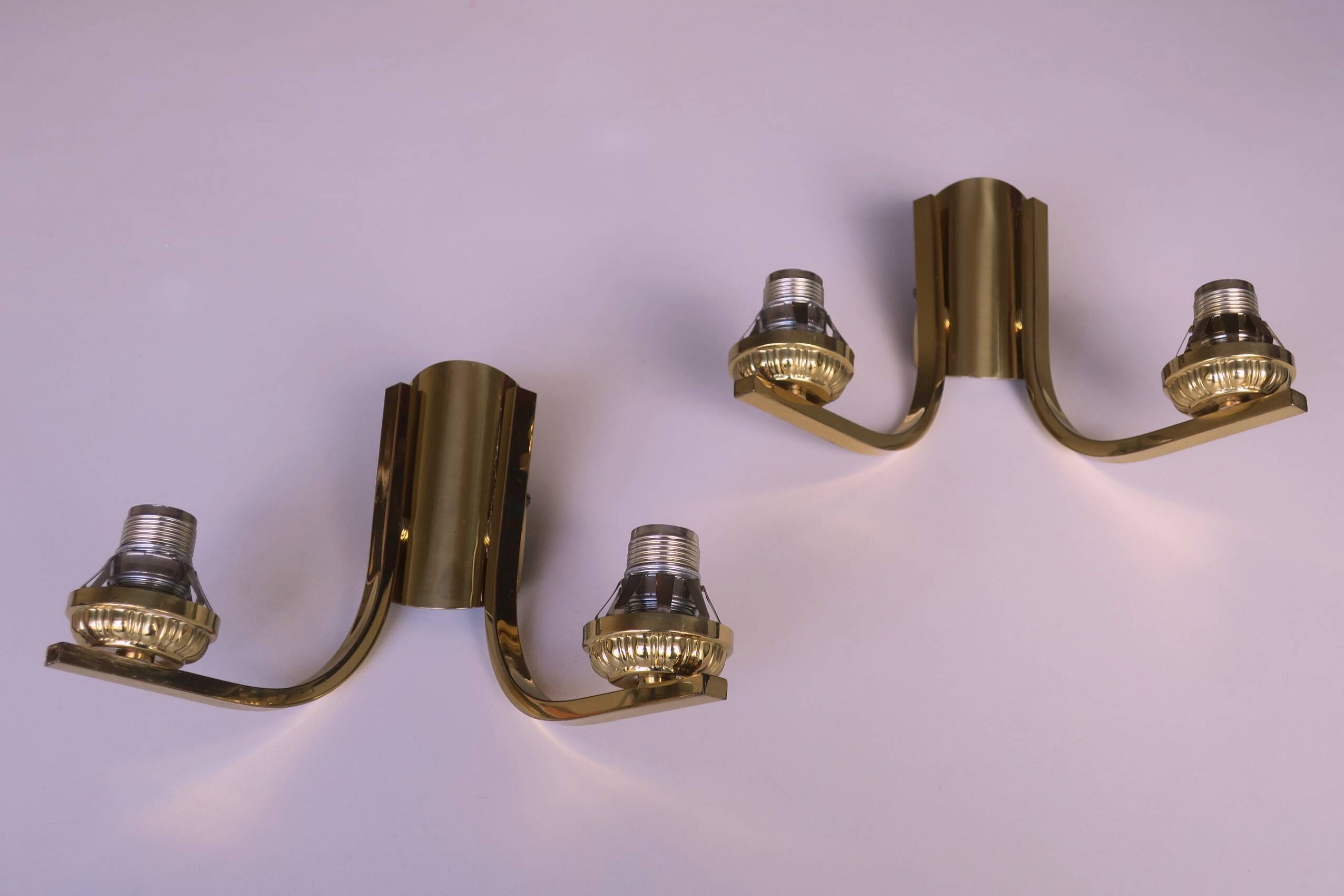 Mid century pair of brass and glass double wall lights, 1970s