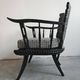 Pair of antique hand-carved armchairs in black lacquer from the 1920s.