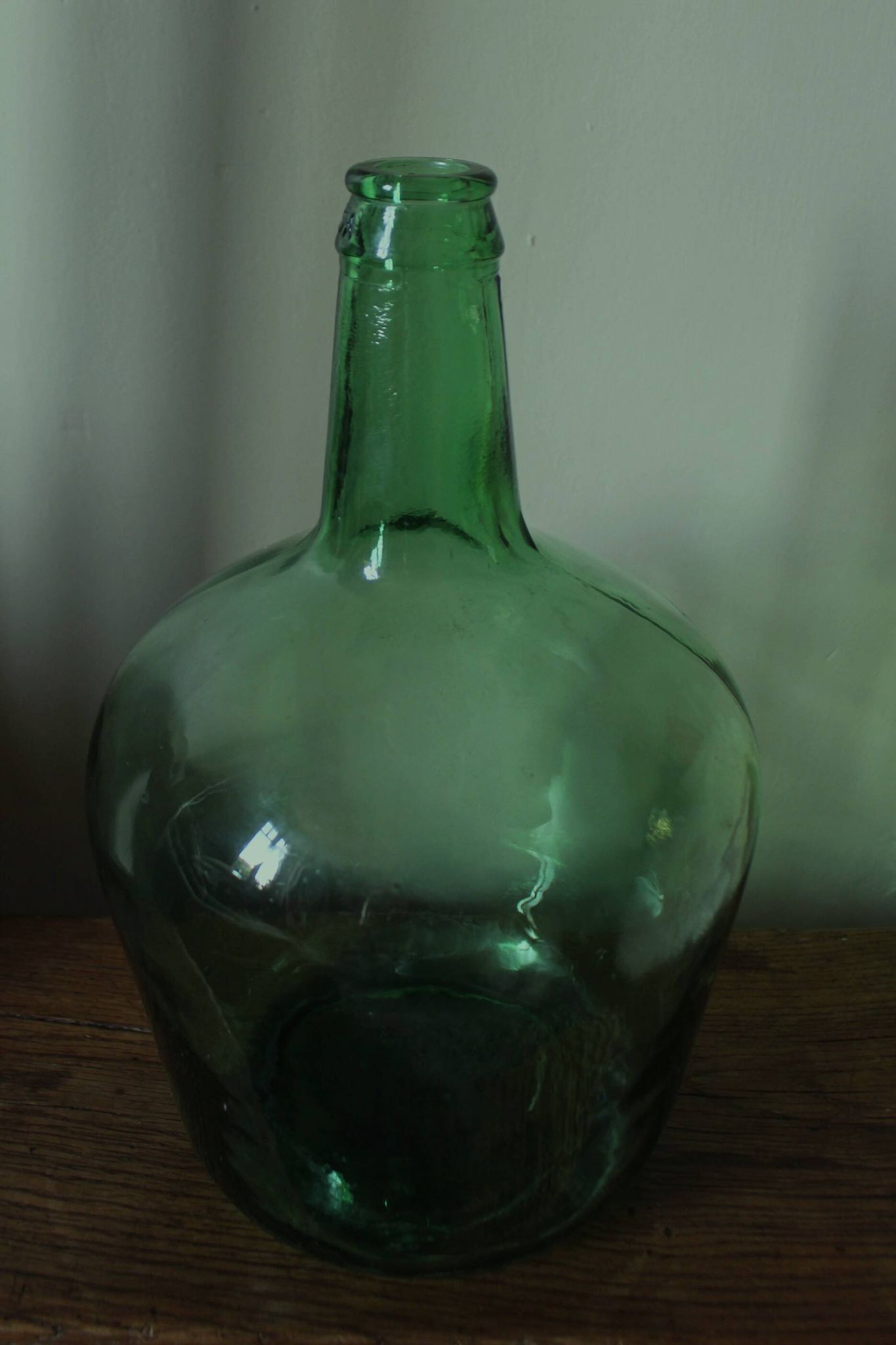 Give me a dark green glass Bonbonne jar.