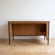 Vintage style desk by Jean Prouvé in oak and black metal.