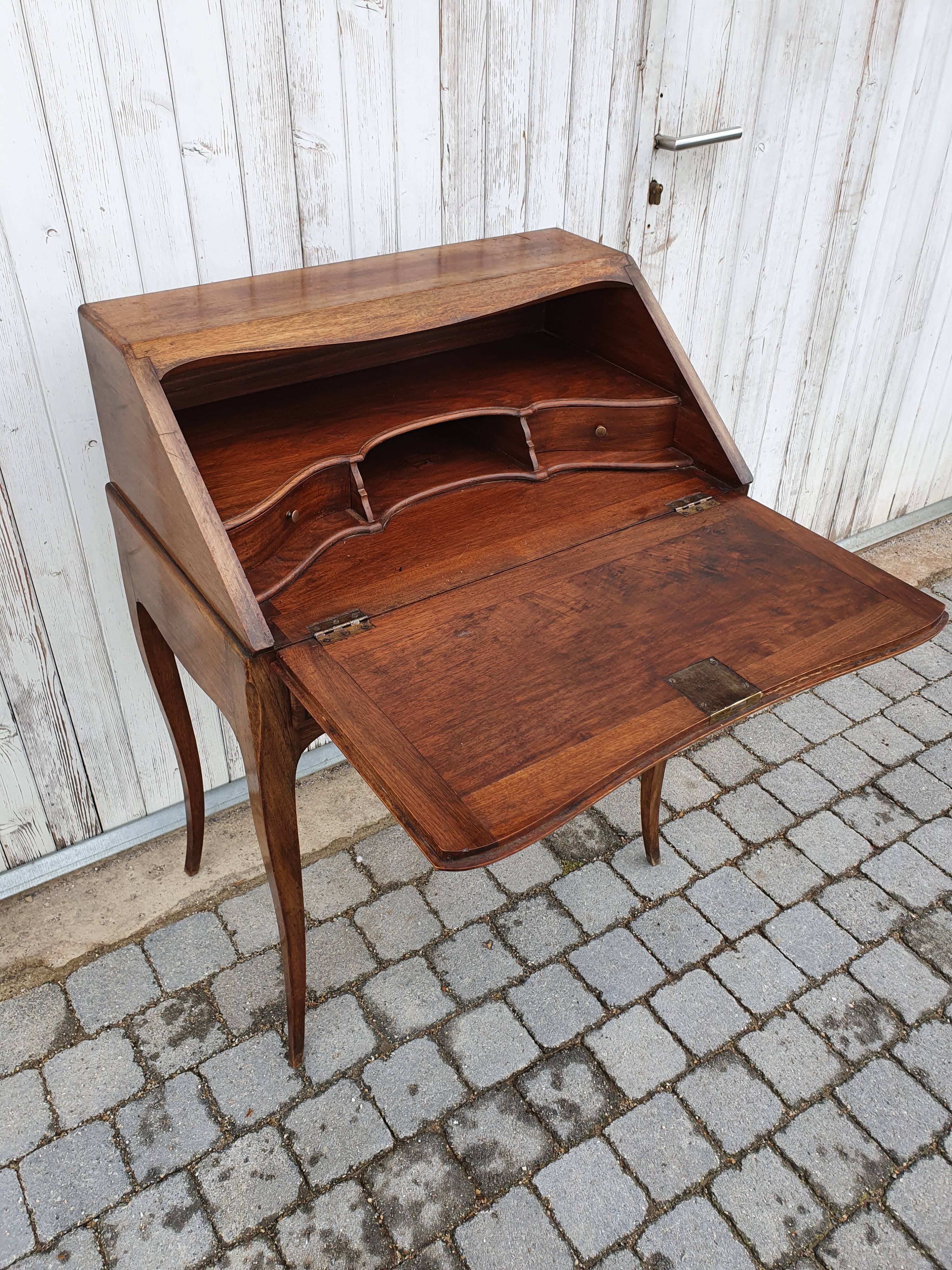 Former small secretary office with a walnut Louis XV