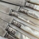Antique table knives in mother-of-pearl and silver-plated metal