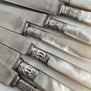 Antique table knives in mother-of-pearl and silver-plated metal