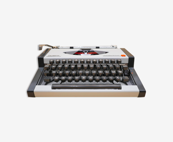 Machine à écrire olympia traveller de luxe blanche vintage révisée