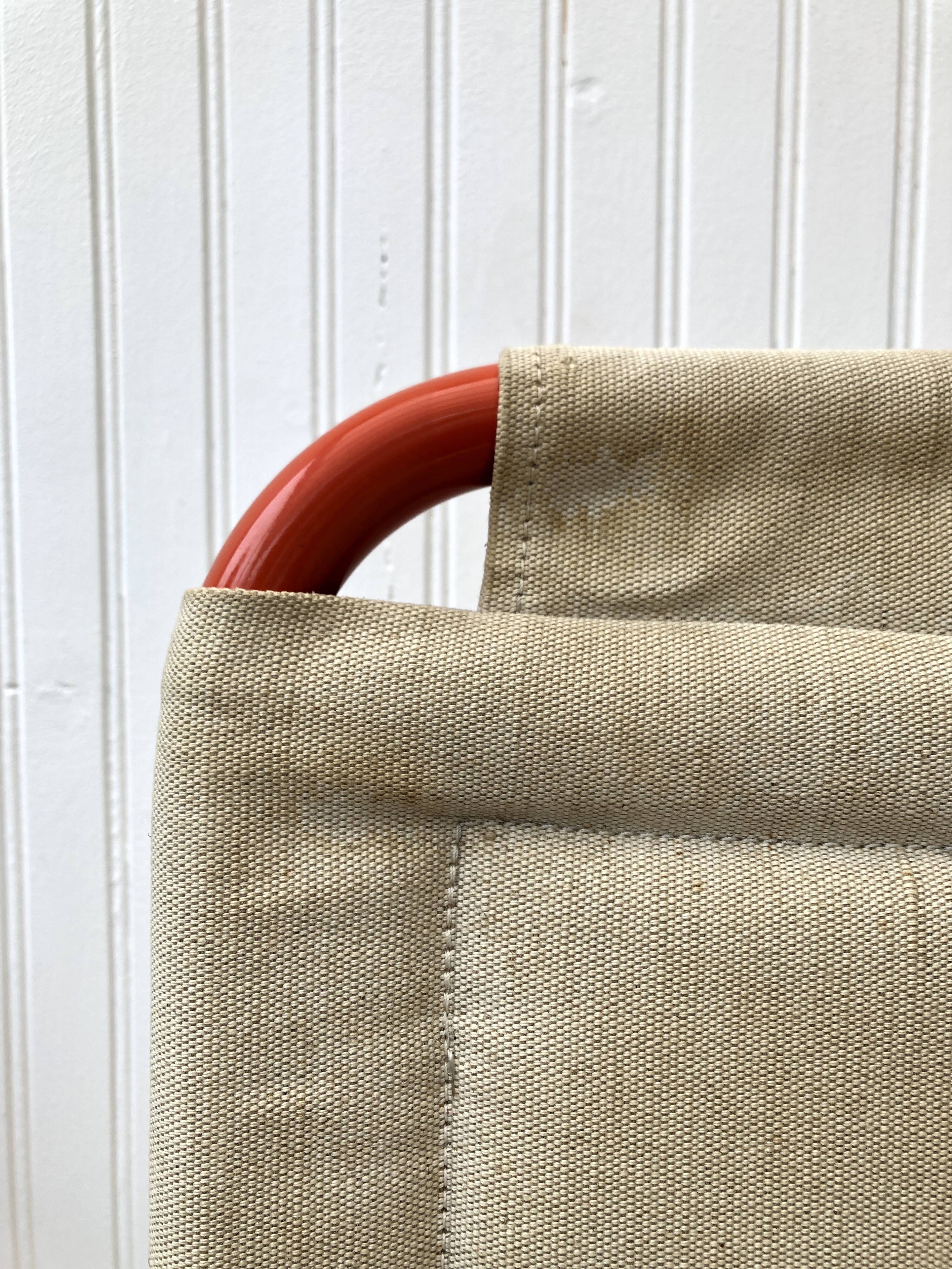 Orange tube chair