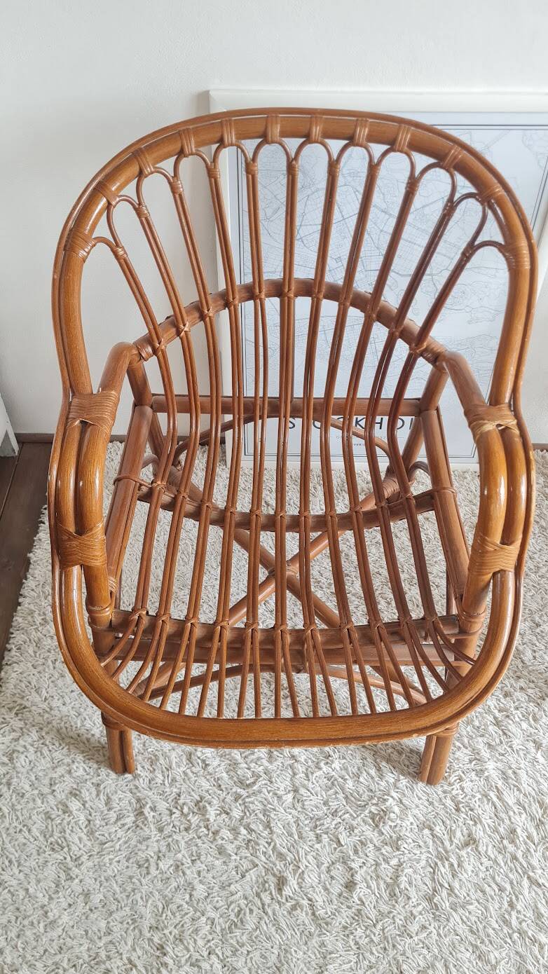 Pair of vintage rattan armchairs circa the 1970s.