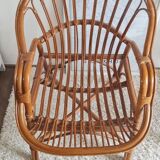 Pair of vintage rattan armchairs circa the 1970s.