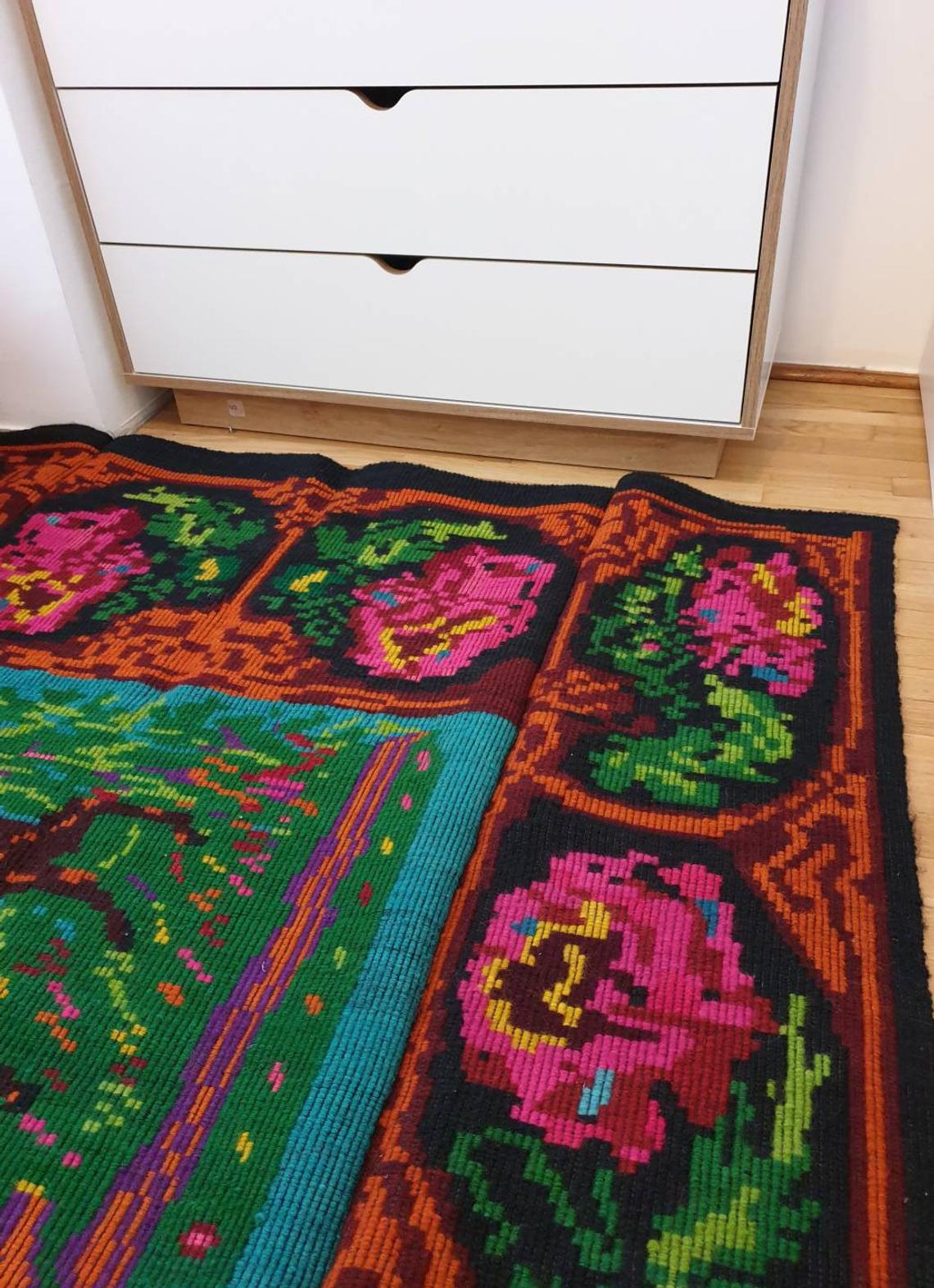 Vintage Romanian rug with deers, nature scenery on a floral background