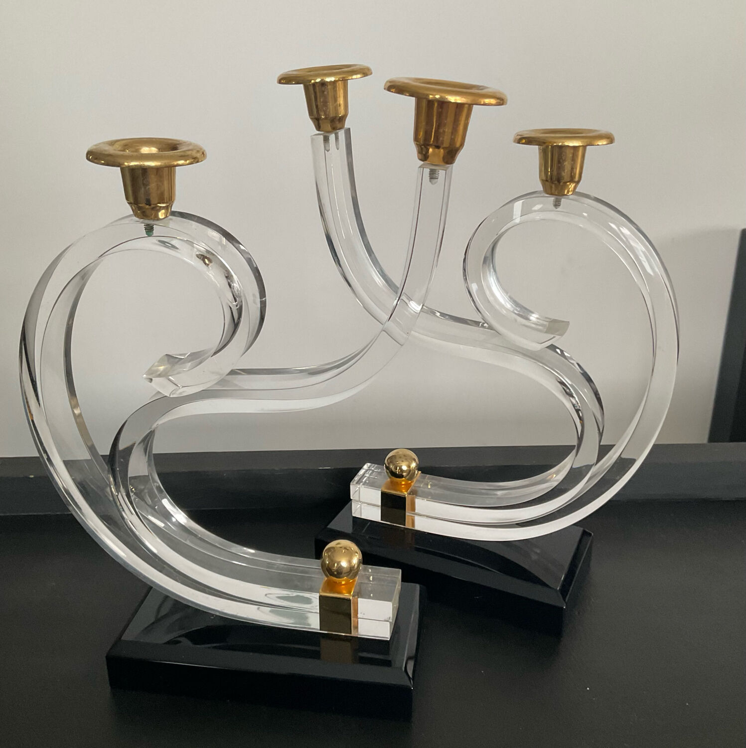 Pair of Hollywood Regency candlesticks in lucite and brass
