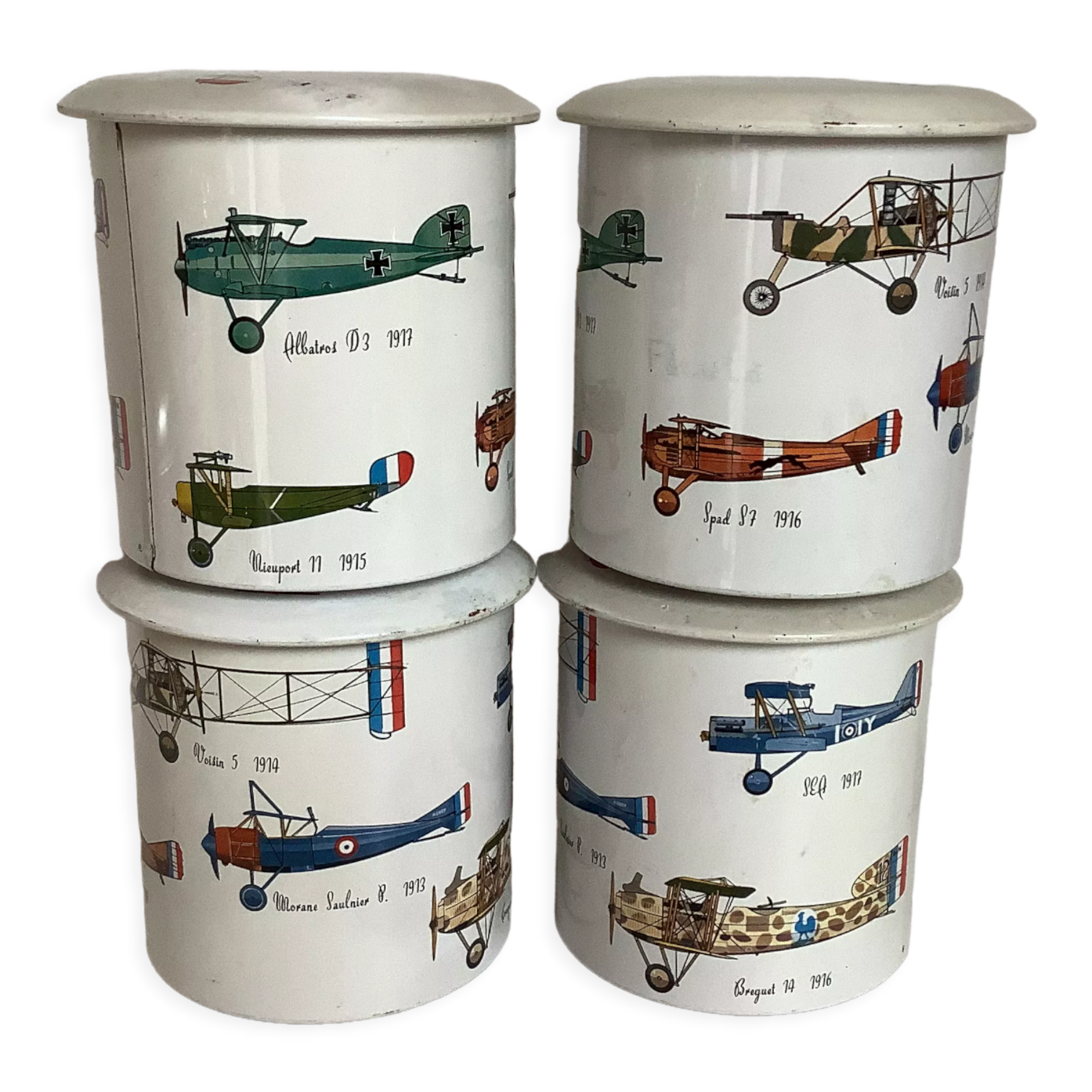 4 old metal boxes lithographed aircraft pattern