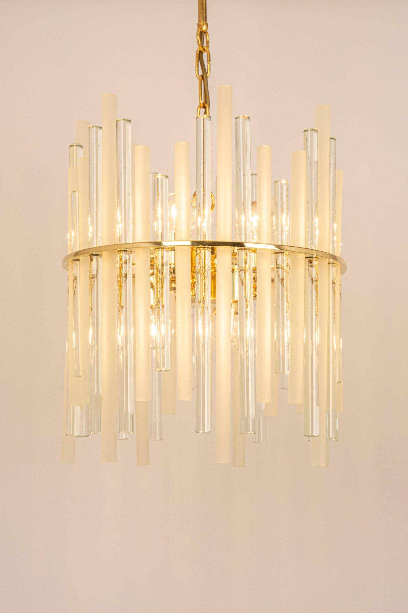 golden brass chandelier with crystal glass rods by C. Palme, Germany, 1970s.