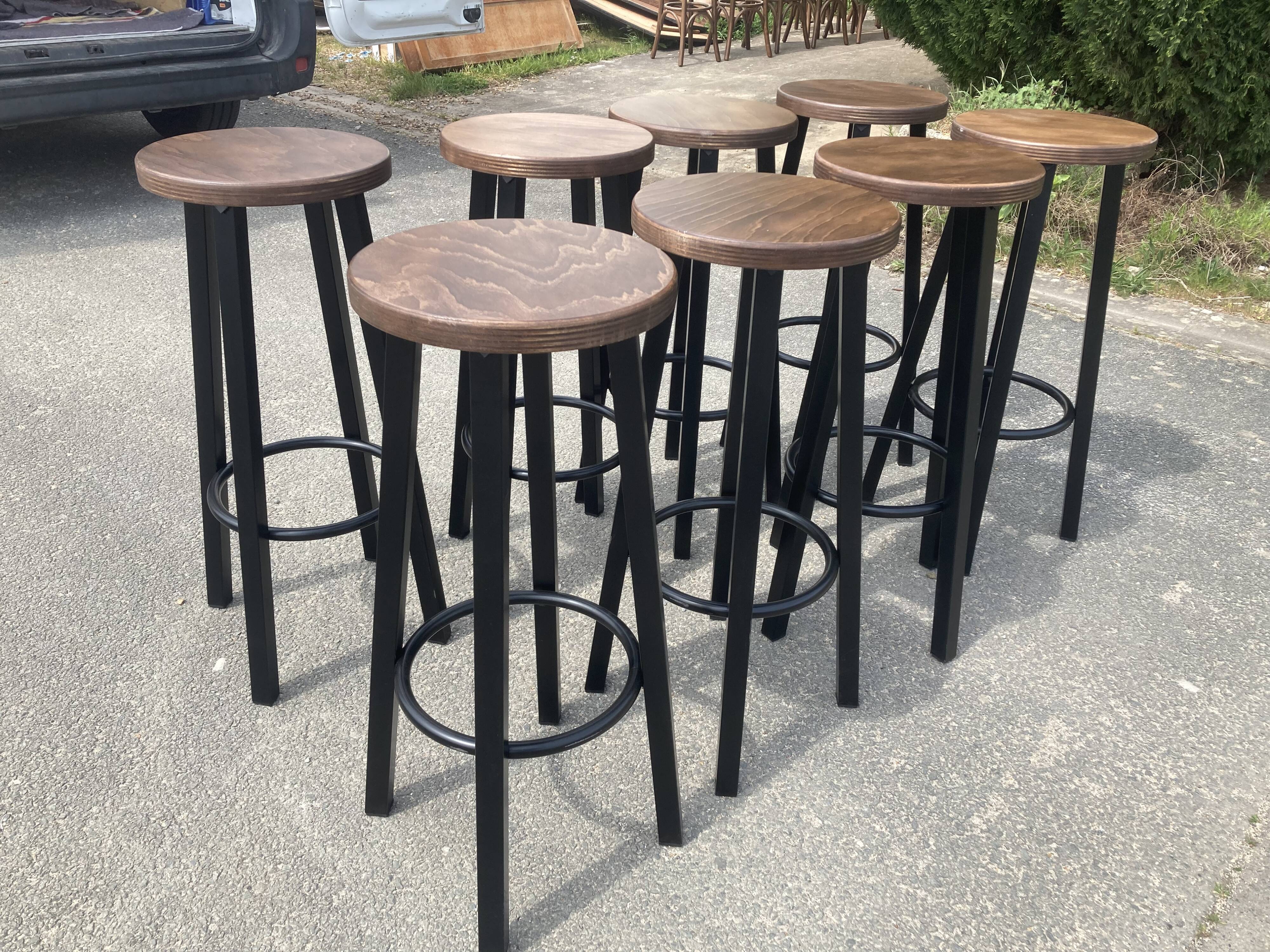 Set of 8 industrial bar stools.