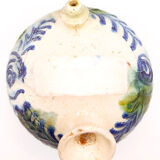 Rustic gurel with floral motifs