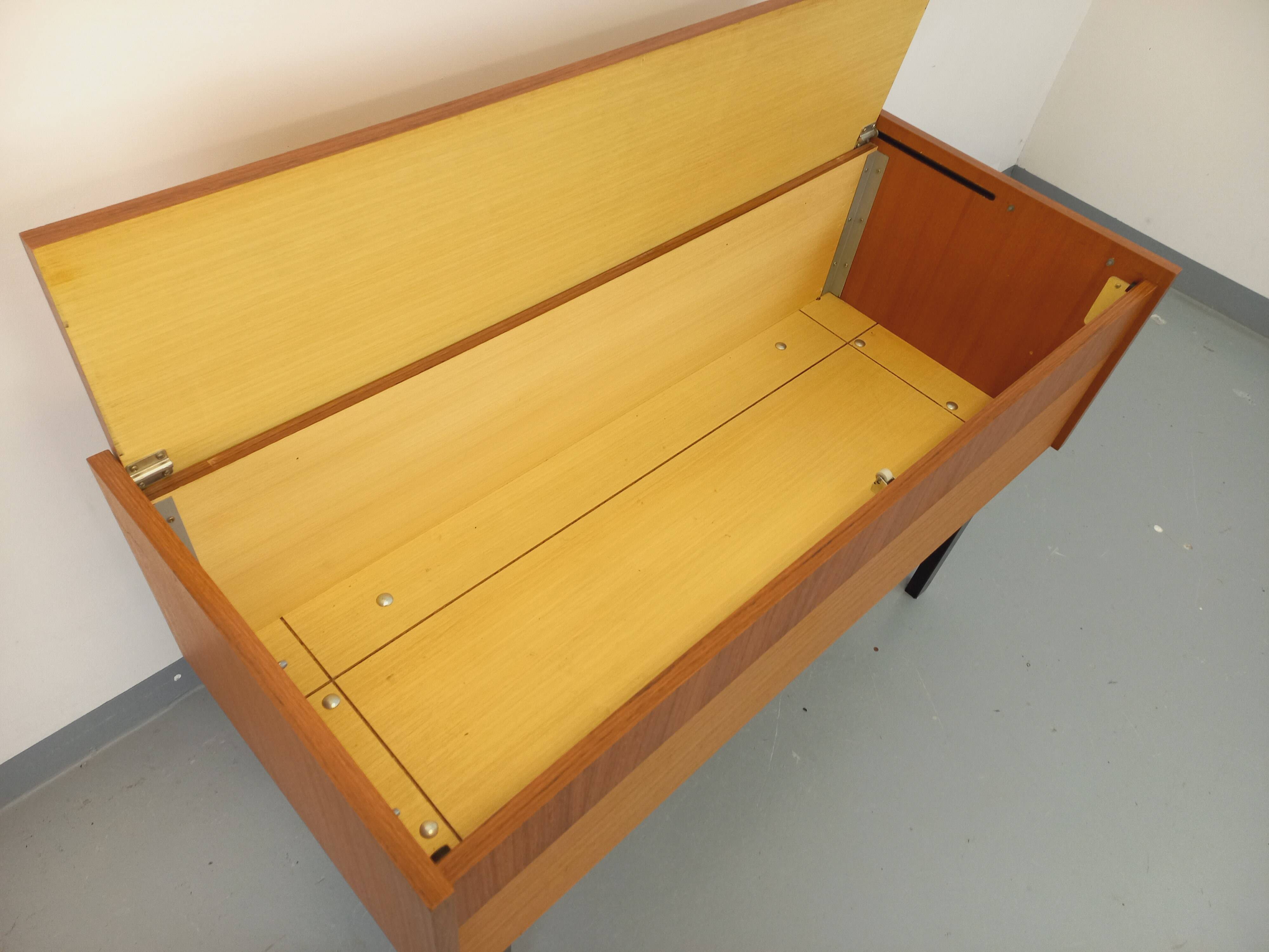 Vintage teak and black metal storage unit / chest on legs from the 70s