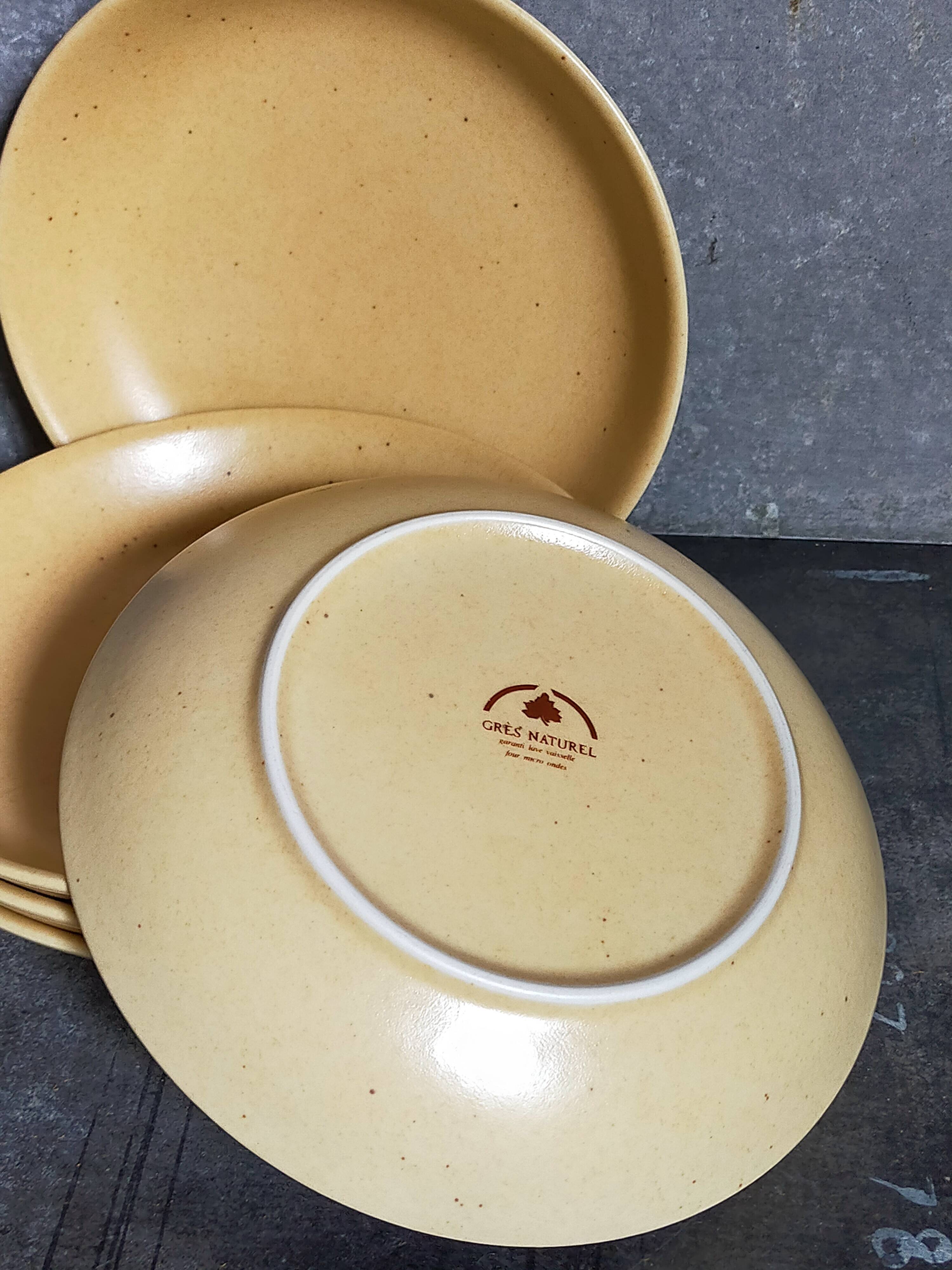 Five vintage natural stoneware soup plates