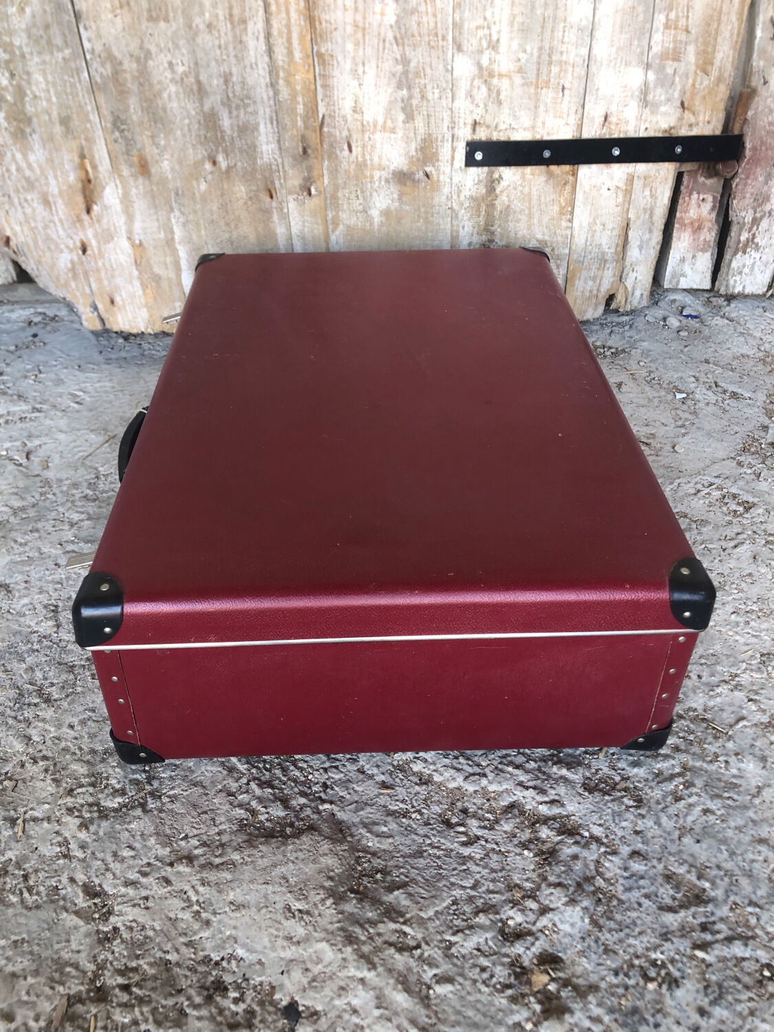 Old suitcase red cardboard bordeaux clasp metal vintage