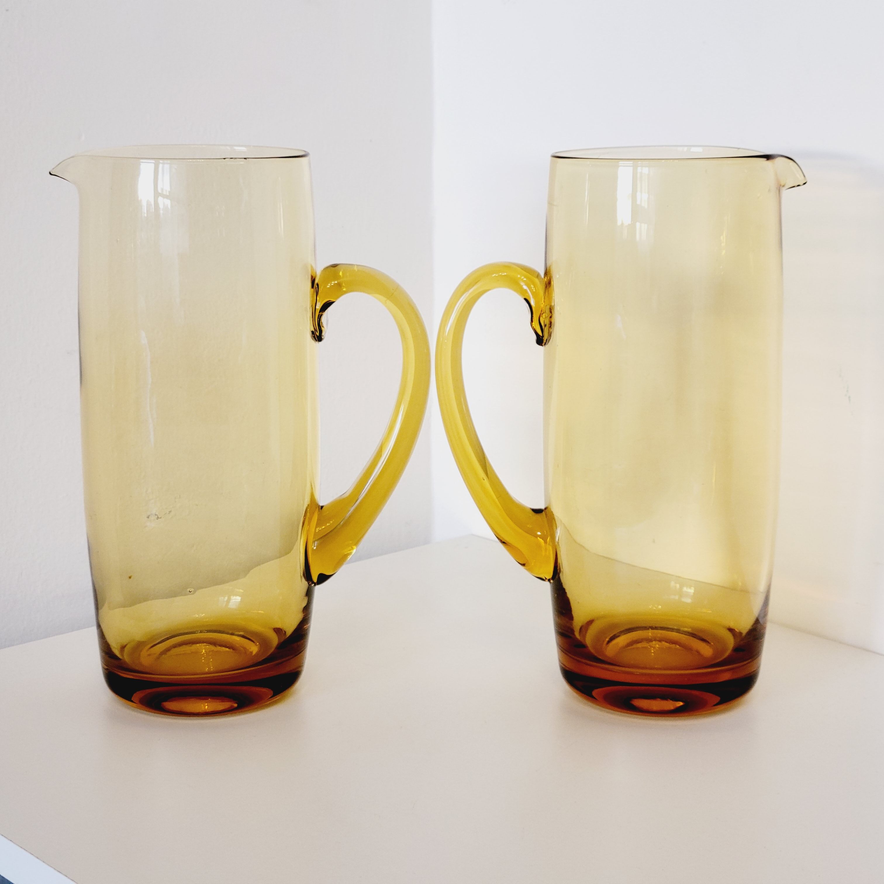 2 carafes in vintage amber yellow blown glass