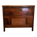 Old carved wooden headboard