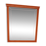 Beveled glass wall mirror in solid wood frame