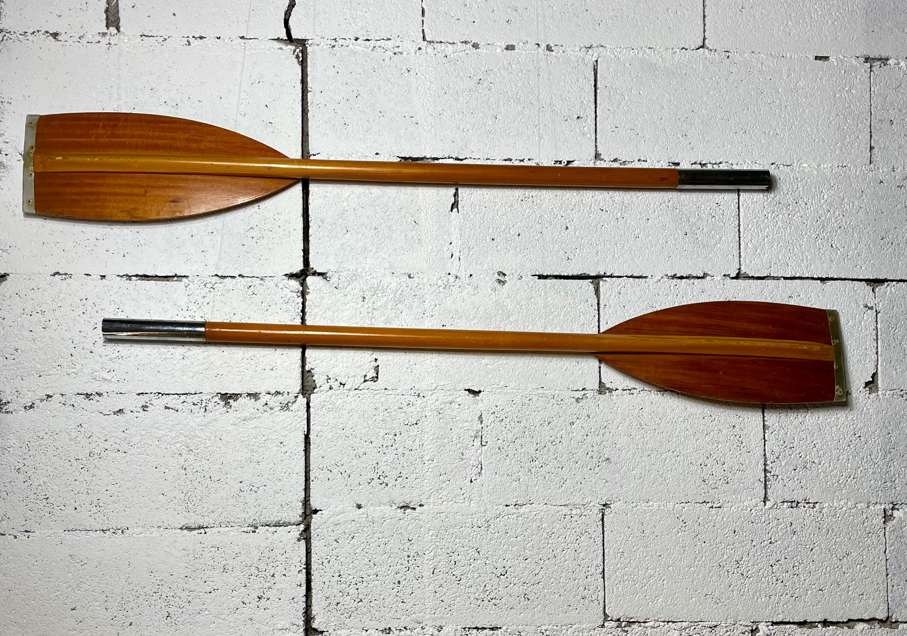 Pair of old wooden paddles