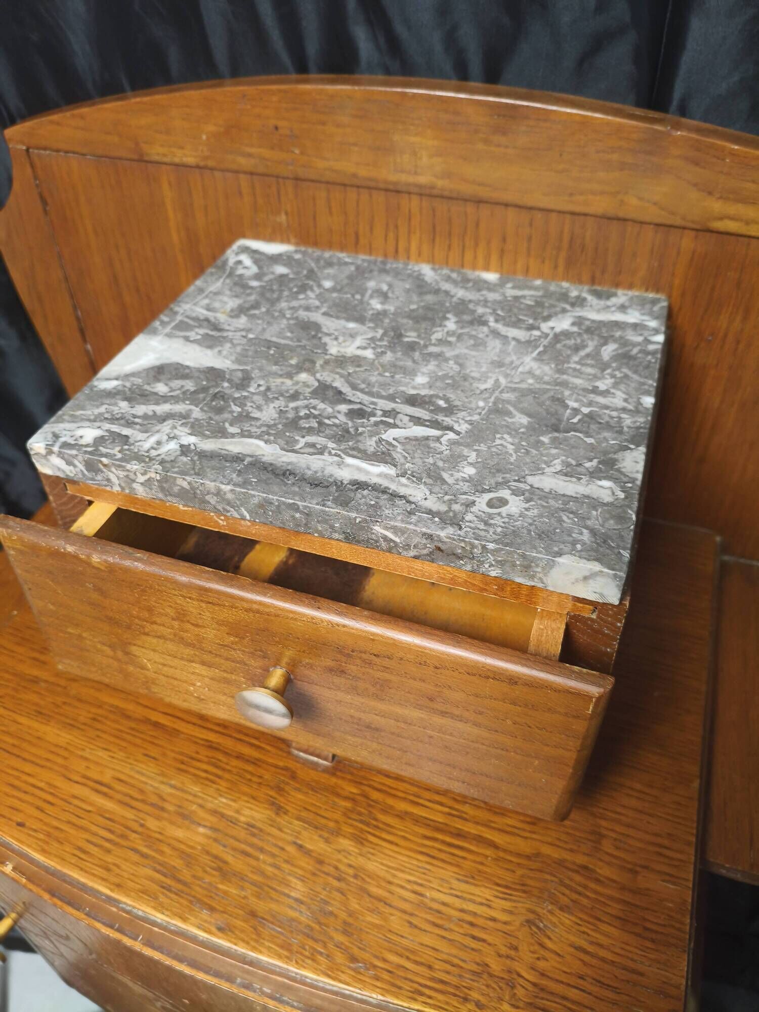 Art Deco bedside table from the 1930s, wooden marble vintage nightstand.