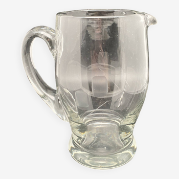 Glass jug with chiseled pattern
