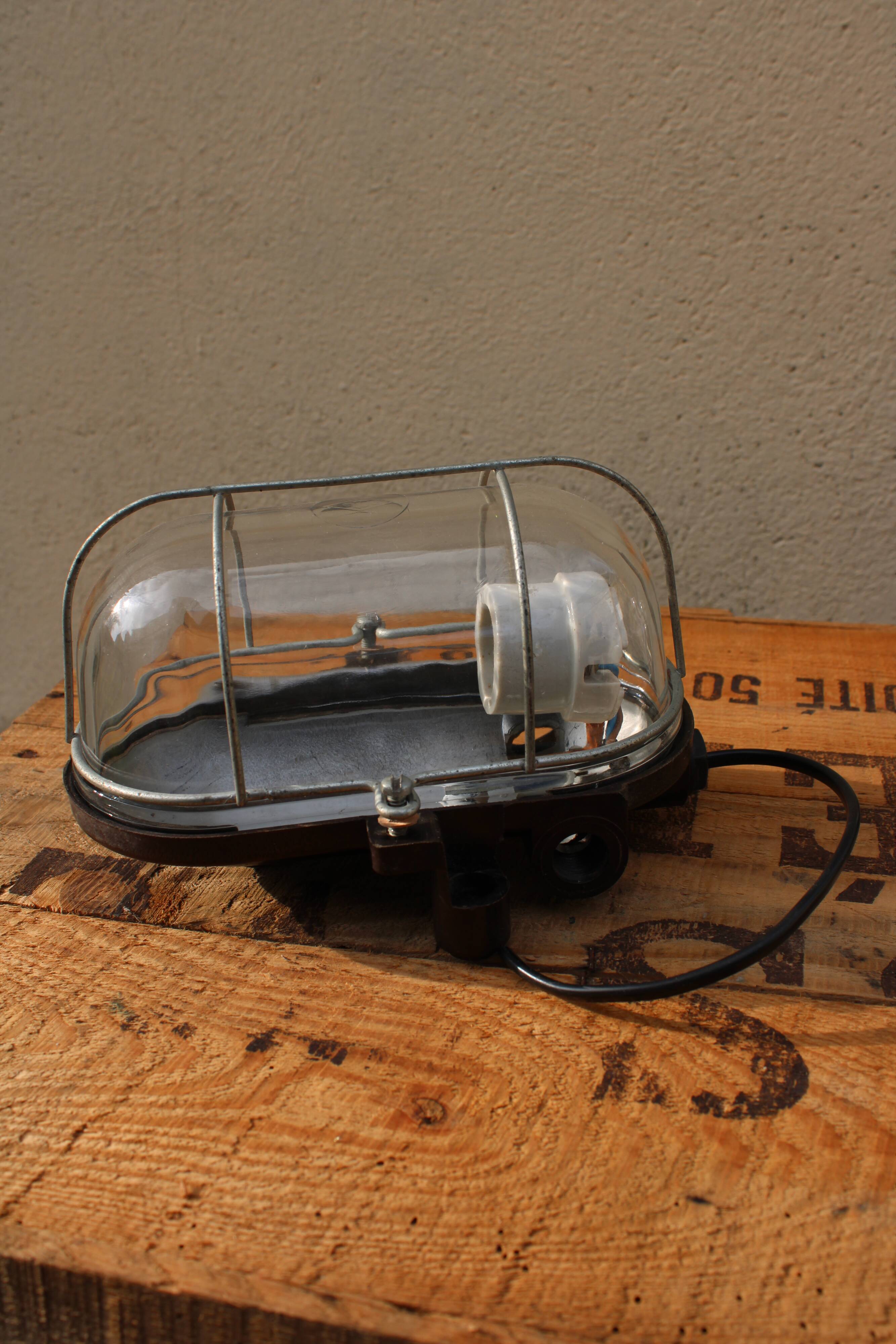 Sconce in bakelite and glass