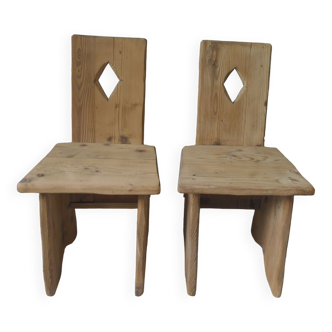 2 brutalist chairs in pitchpin waxed finish.