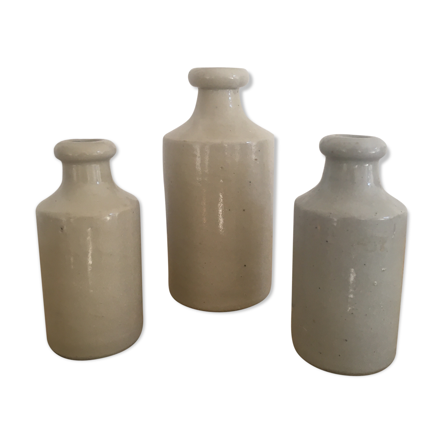 Three bottles of Mercure Bourdon Frères Paris sandstone